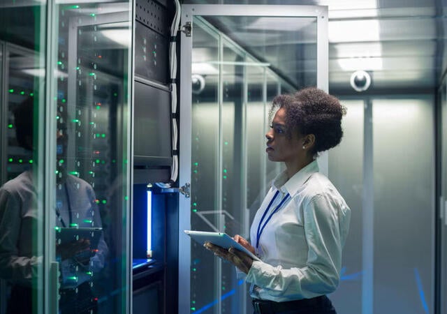 A person working in a data center