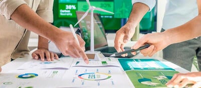 People look at chart spread on a table