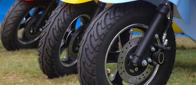 Three modern scooters