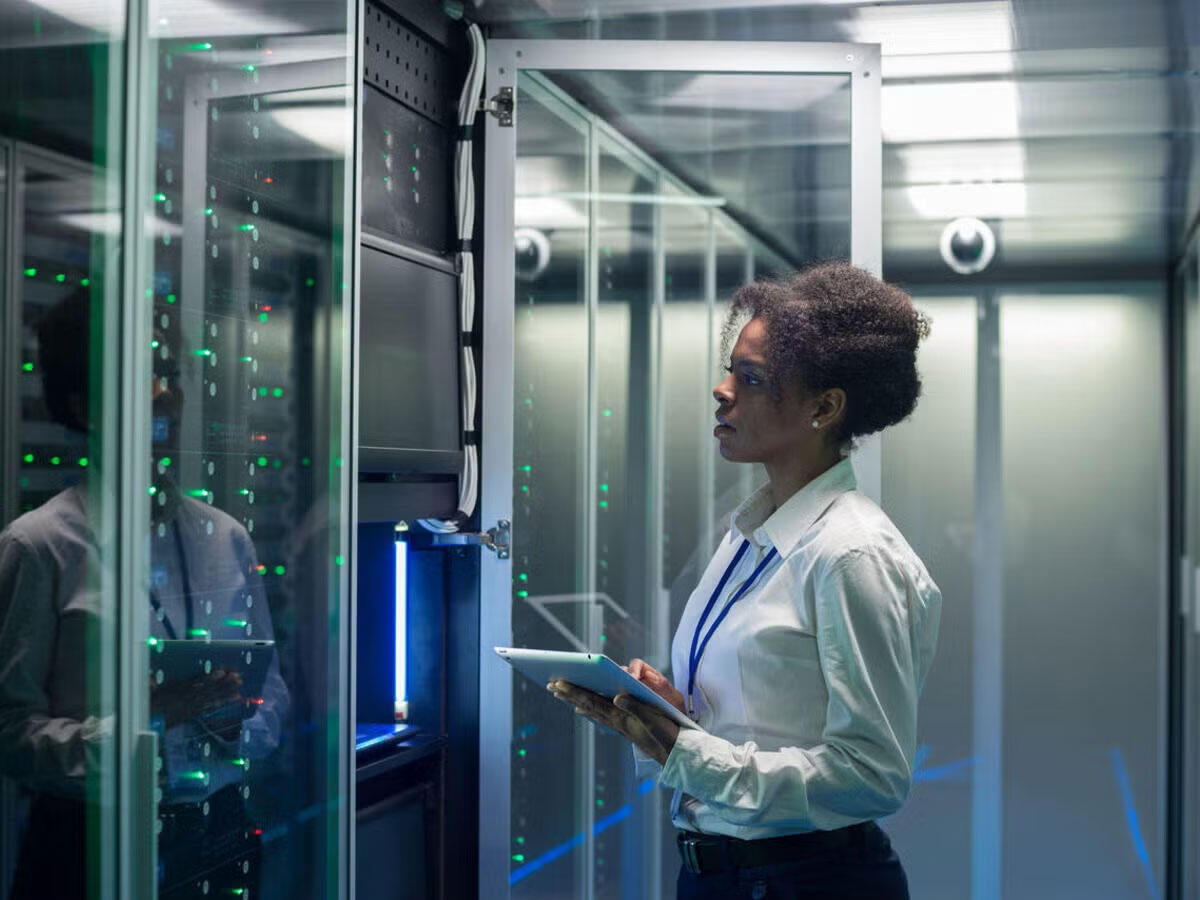 A person working in a data center