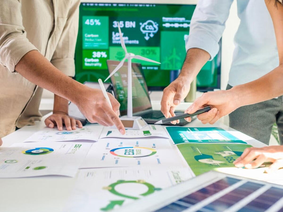 People look at chart spread on a table