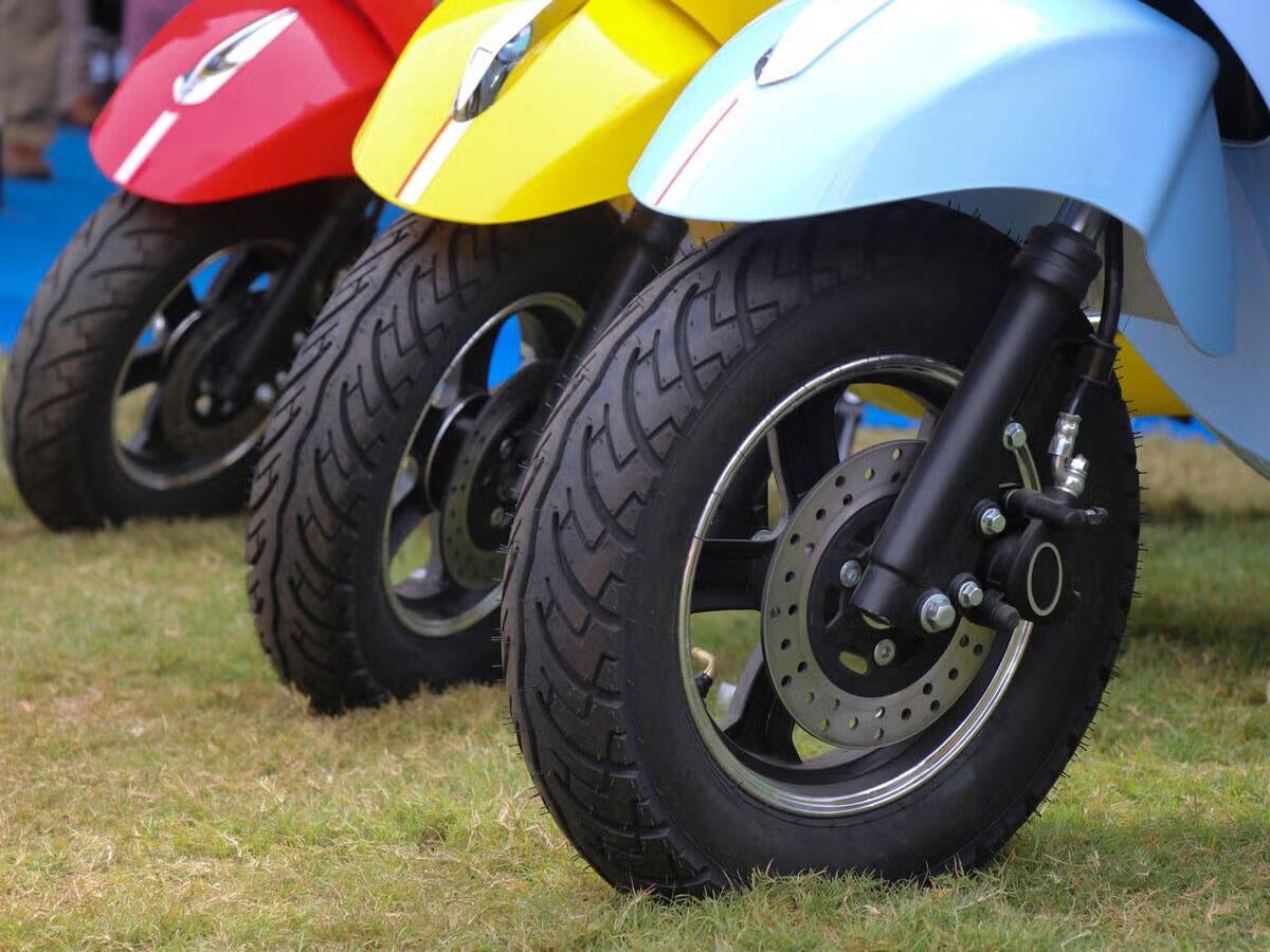 Three modern scooters