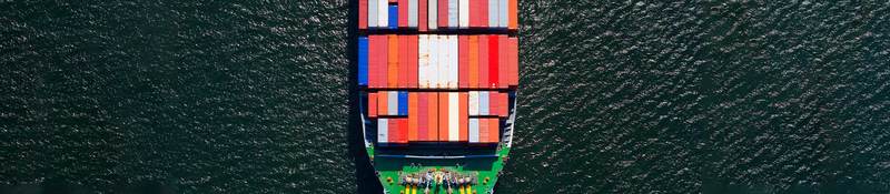 Aerial view of a cargo boat with containers