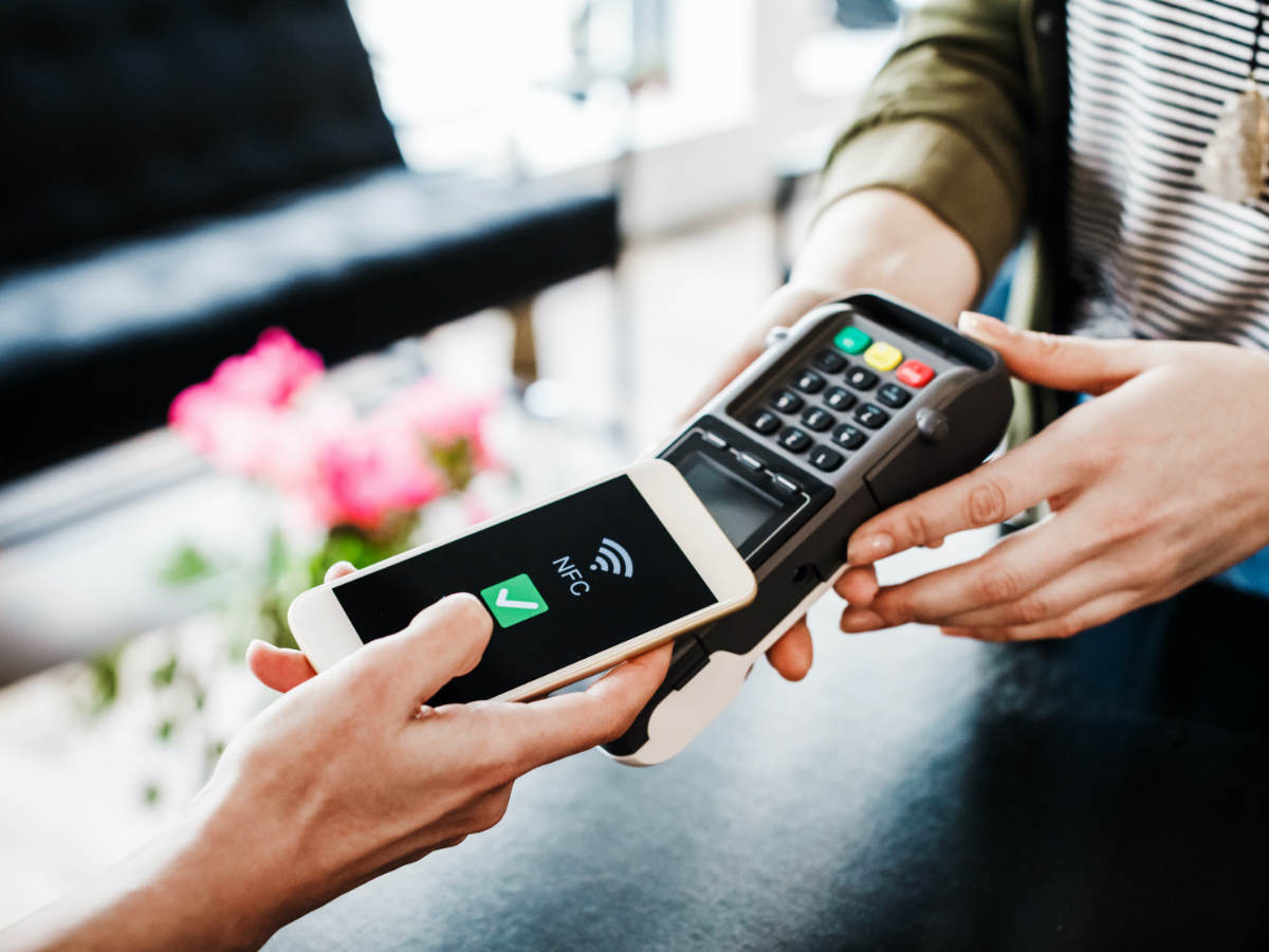 Person using a mobile phone for payment